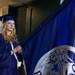 Graduate Abigail Raver holds Pioneer's flag before the processional during Pioneer's class of 2013 graduation ceremony at EMU's Convocation Center Thursday, June 6.Courtney Sacco I AnnArbor.com 